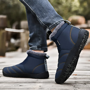 Men's insulated waterproof winter boots in a slip-resistant design, featuring a rugged and durable construction ideal for cold weather, with a focus on keeping feet warm and dry.