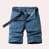 Men's dark blue summer shorts made of breathable cotton with a casual fit and herringbone pattern.