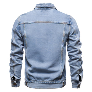 Men's light blue denim trucker jacket featuring long sleeves, a button-up front, and a classic collar, designed for casual spring wear.