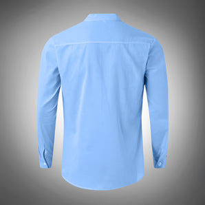 Men's light blue slim fit cotton Oxford dress shirt with button-cuff and no pocket, featuring a classic collar and long sleeves.