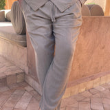 Men's lightweight beige linen pants in a relaxed fit, perfect for summer fashion and resort wear, shown in a khaki color and size XXL, with a focus on the waist, thigh, and knee areas.