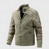 Men's lightweight black quilted jacket with an insulated motorcycle style, featuring a collar and long sleeves, made from natural materials.