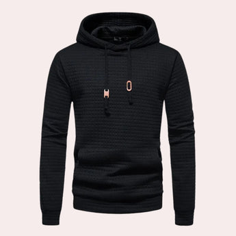 Men's lightweight black quilted hoodie in size 2XL, featuring a stylish and textured design with a hood, long sleeves, and a comfortable fit.
