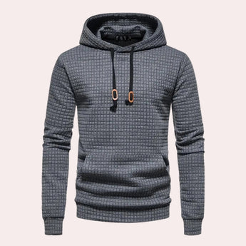 Men's dark gray quilted hoodie in size 2XL, featuring a stylish textured design, long sleeves, and a high collar.