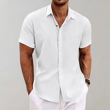 Men's white linen Henley short sleeve shirt in size 3XL, featuring a breathable fabric ideal for casual summer wear. The shirt includes a collar and a comfortable fit around the neck and sleeves, shown in a relaxed gesture.