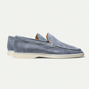 Men's luxury blue suede slip-on loafers with a stylish design, featuring an electric blue hue and crafted from high-quality suede leather.