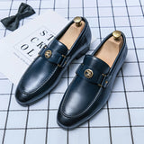 Men's luxury brown leather loafers with a buckle, formal slip-on shoes for dress occasions.