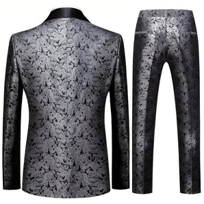 Men's luxury floral brocade suit in grey, featuring a blazer with an intricate floral pattern, structured collar, and long sleeves, perfect for weddings and cocktail events.