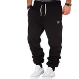 Men's luxury grey joggers with cuffed ankles, shown in black color, size 3XL, highlighting the comfortable fit around the waist and thighs, designed for athletic and casual wear.
