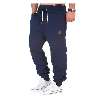Men's luxury grey joggers with designer athletic cuffed sweatpants style, shown in a blue color and 3XL size, featuring a comfortable fit around the waist, knee, and thigh, suitable for sportswear and casual fashion.