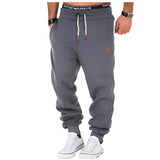 Men's luxury dark gray joggers in size 3XL, featuring a cuffed design with an athletic fit, suitable for casual fashion and sportswear.