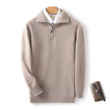Men's luxury half-zip cashmere sweater in grey, featuring long sleeves and a soft collar, ideal for winter wear.