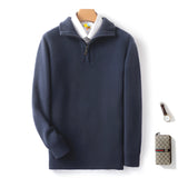 Men's grey luxury half-zip cashmere sweater with a high collar and long sleeves, showcasing premium winter knitwear.