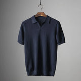 Men's marine blue luxury knit polo shirt in size 3XL, featuring a stylish design with a collar, buttons, and a breathable fabric.