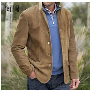 Men's luxury suede blazer in khaki, size 3XL, showcasing elegant tailoring with a collar and long sleeves, worn by a model with a beard.