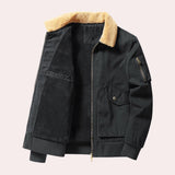 Men's luxury tan shearling bomber jacket in dark blue, featuring a warm winter design with a button-up front, long sleeves, and a classic collar. The jacket includes stylish pockets and a fashionable pattern, suitable for a 2XL size.