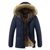 Men's dark blue waterproof insulated parka with a fur-lined hood, featuring long sleeves and a full-length design ideal for cold weather.