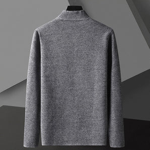 Men's luxury wool grey turtleneck sweater displayed on a clothes hanger, featuring long sleeves and a high collar, suitable for warm winter wear.