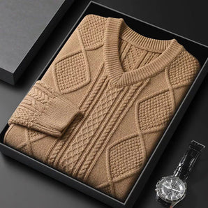 Men's luxury wool turtleneck sweater in a designer fashion style, featuring a high neck and fine knit pattern, displayed against a wooden background.