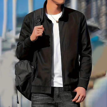 Men's minimalist black bomber jacket in 2XL size, featuring a sleek design with a collar, long sleeves, and a comfortable fit around the waist, styled in a versatile and modern look.