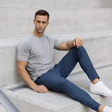 Light grey men's moisture-wicking quick-dry athletic t-shirt, featuring short sleeves and a comfortable fit suitable for active wear.