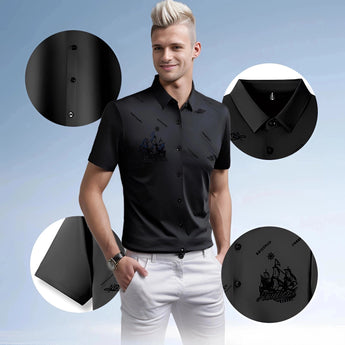Men's nautical teal embroidered polo shirt modeled by a smiling man standing with hands in pockets, wearing white shorts. The shirt features short sleeves and is styled for a summer look.