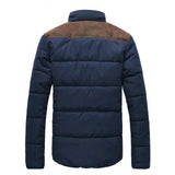 Men's navy blue insulated water-resistant puffer jacket with long sleeves and a high collar, shown in a sporty and casual style.
