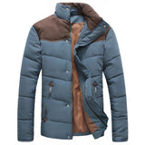 Men's navy blue insulated puffer jacket with a water-resistant finish, featuring long sleeves, a high collar, and side pockets, in a size 3XL.