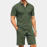 Men's light green polo and shorts set, featuring a breathable short-sleeve polo shirt with a collar and matching active shorts, designed for casual summer wear.