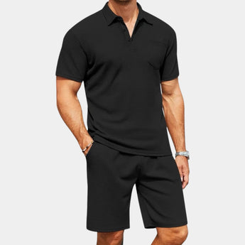 Men's black polo shirt and shorts set in size 2XL, featuring short sleeves and a collared neckline, suitable for casual summer wear and designed for breathability.