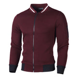 Men's burgundy red slim fit quilted bomber jacket featuring a casual design with long sleeves and a knitted neck collar, suitable for versatile outerwear occasions.