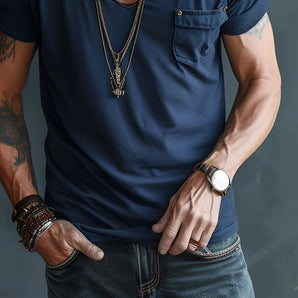 Men's navy fitted t-shirt showcasing trendy urban street style fashion, with focus on the short sleeves, round neckline, and comfortable fit around the waist.