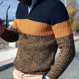 Men's chunky knit high-collar sweater in navy mustard with yellow accents, featuring long sleeves and a textured pattern.