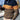 Men's chunky knit high-collar sweater in navy mustard with yellow accents, featuring long sleeves and a textured pattern.