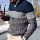Men's gray chunky knit sweater with a high collar, featuring a textured design and long sleeves.