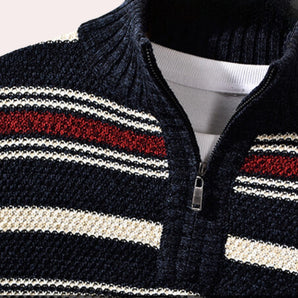 Men's navy zip-up sweater with red stripes, featuring a casual knitwear design, long sleeves, and a collar.