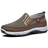 Men's navy blue waterproof slip-on walking shoes with a lightweight and anti-slip design, suitable for outdoor activities and casual wear.