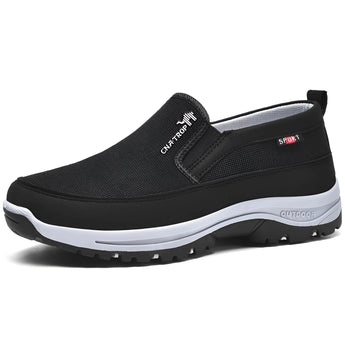 Men's navy slip-on walking shoes, lightweight and waterproof with anti-slip soles, designed for outdoor use.