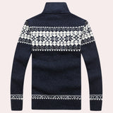 Men's Nordic wool sweater in dark blue with snowflake pattern and turtleneck collar, featuring long sleeves and intricate textile design.