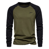 Men's olive green and black raglan sweatshirt, designed as a stylish autumn pullover. Features a military green body with contrasting black sleeves, a crew neck collar, and a comfortable fit, ideal for casual or sportswear occasions.