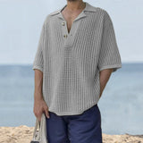 Men's gray crochet polo shirt in size 3XL, featuring a collar and short sleeves, styled with a breathable and eco-friendly fabric.