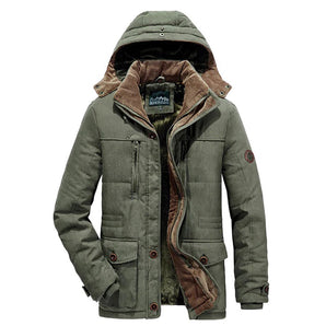 Men's olive green fleece-lined tactical winter jacket with pockets, featuring a fur-lined collar and long sleeves.
