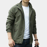 Men's olive green hooded cargo jacket, lightweight and designed for urban wear, shown in light green color, size 3XL. The jacket features long sleeves, a collar, and a waist-length cut.