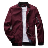 Men's olive green lightweight bomber jacket featuring a zipper pocket, with a classic design including a collar and long sleeves.