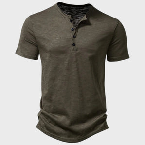 Men's olive green slim fit Henley shirt with short sleeves and a buttoned collar in a casual style, displayed in a light green shade for size 2XL.