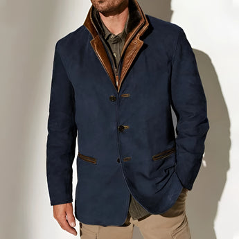 Men's olive green suede blazer with a refined collar and button detailing, featuring a tailored sleeve design and sleek pockets, presented as a luxury sport coat.