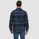 Men's orange plaid flannel shirt with long sleeves, featuring a classic tartan pattern.