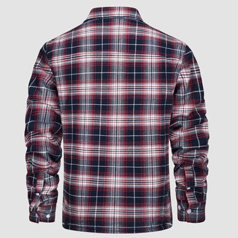Men's orange plaid flannel shirt featuring a tartan pattern with long sleeves and a classic collar.
