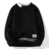 Men's black ribbed knit pullover sweater in size 3XL, featuring long sleeves and a collar, made from organic cotton with a woolen texture for an eco-friendly fashion choice.