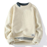 Men's beige ribbed knit pullover sweater made from organic cotton, featuring long sleeves and a round collar, shown in size 3XL.